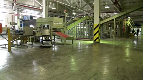 factory interior with machinery and conveyor belts