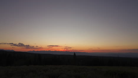 perfect sunset forest mountain in silhouettes. timelapse