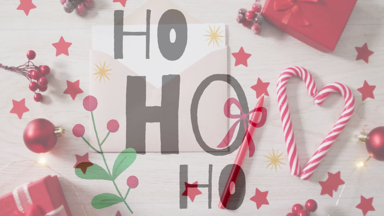 HO text animation over Christmas decorations with candy canes and gifts