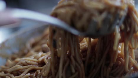 Serving-spaghetti-with-a-big-spoon