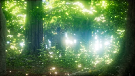 great red deer in a green forest