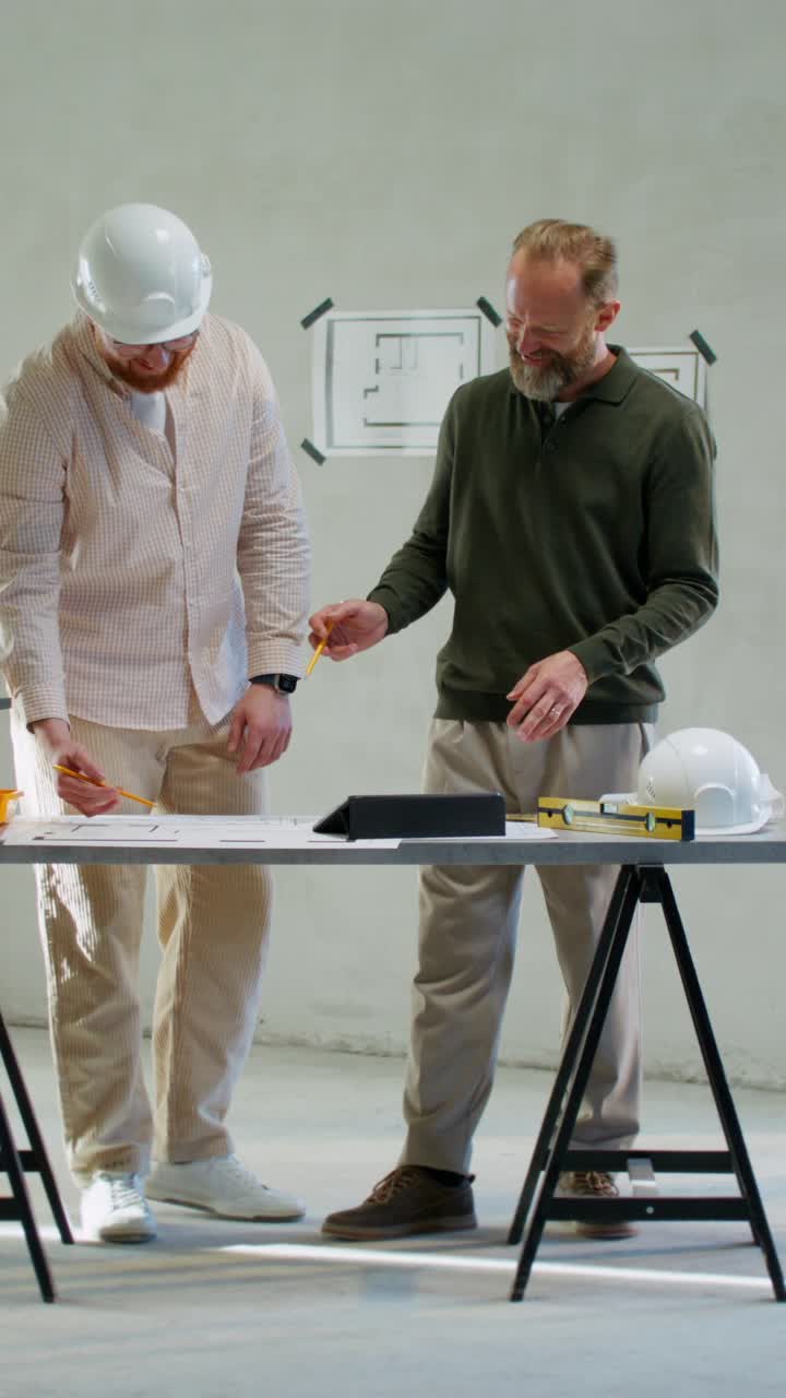 Architects Reviewing Building Plans