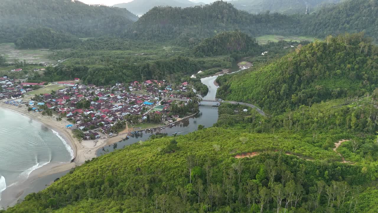 Drone aerial view of indonesian town city village near padang west sumatra
