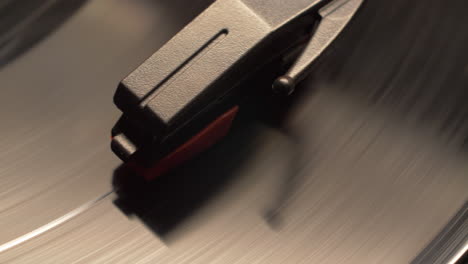 slider move on a spinning vintage vinyl music album playing on a retro record player