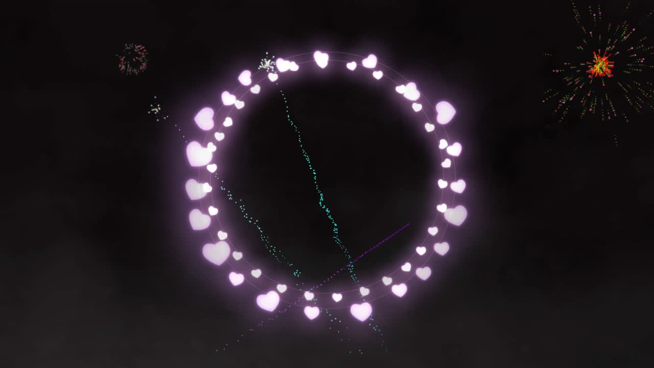 Animation of circle of heart fairy lights with christmas and new year fireworks in night sky