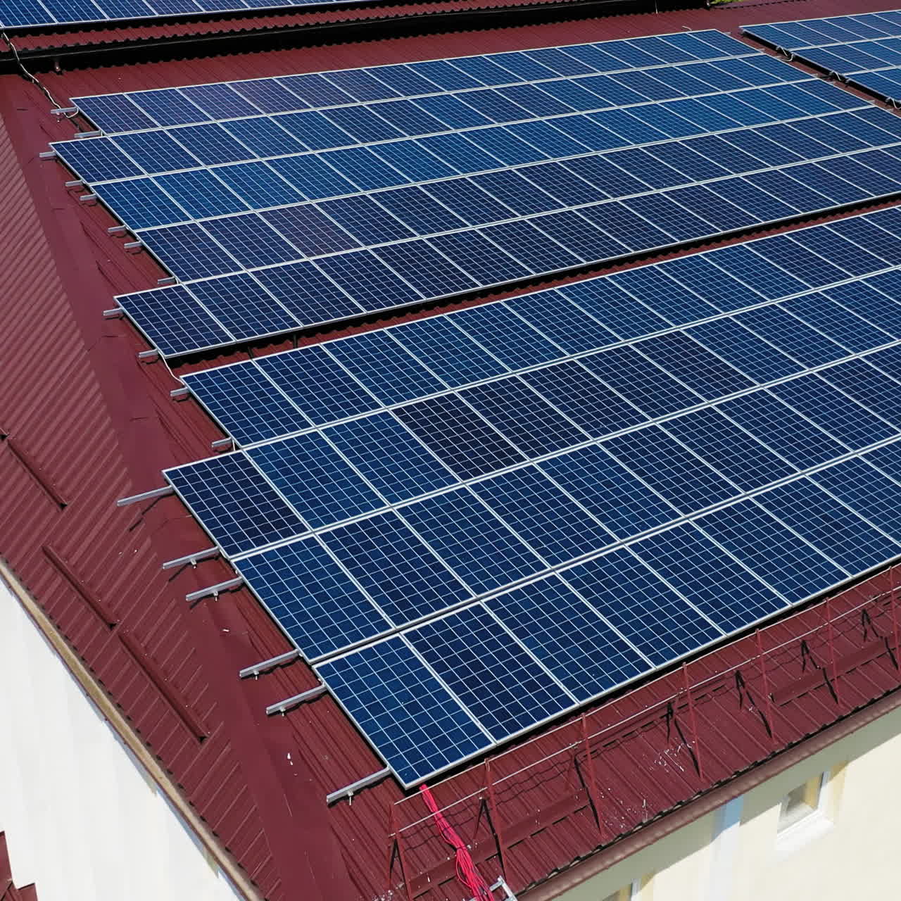 Aerial view. Top view on blue solar pannels. Green energy. Pannels on the roof.