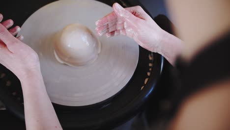 potter's wheel potter works with his hands