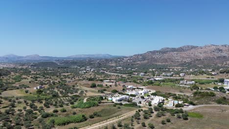 Green-Forest-in-Rhodes-with-seaside-in-the-background-in-Greece-during-the-summer-filmed-with-the-drone-in-4K