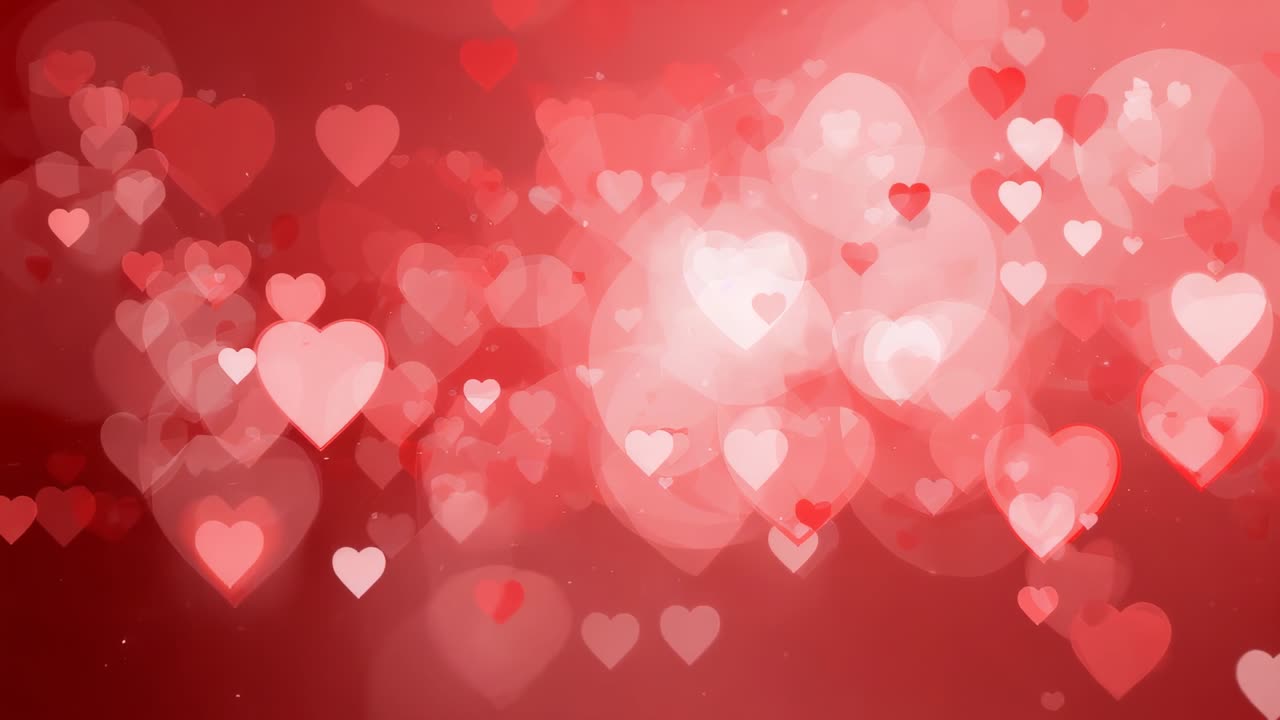 Fotogrammi progressivi che causano l'illuminazione incandescente centrale e il bokeh a cuore che si spostano sul gradiente rosso-rosa
