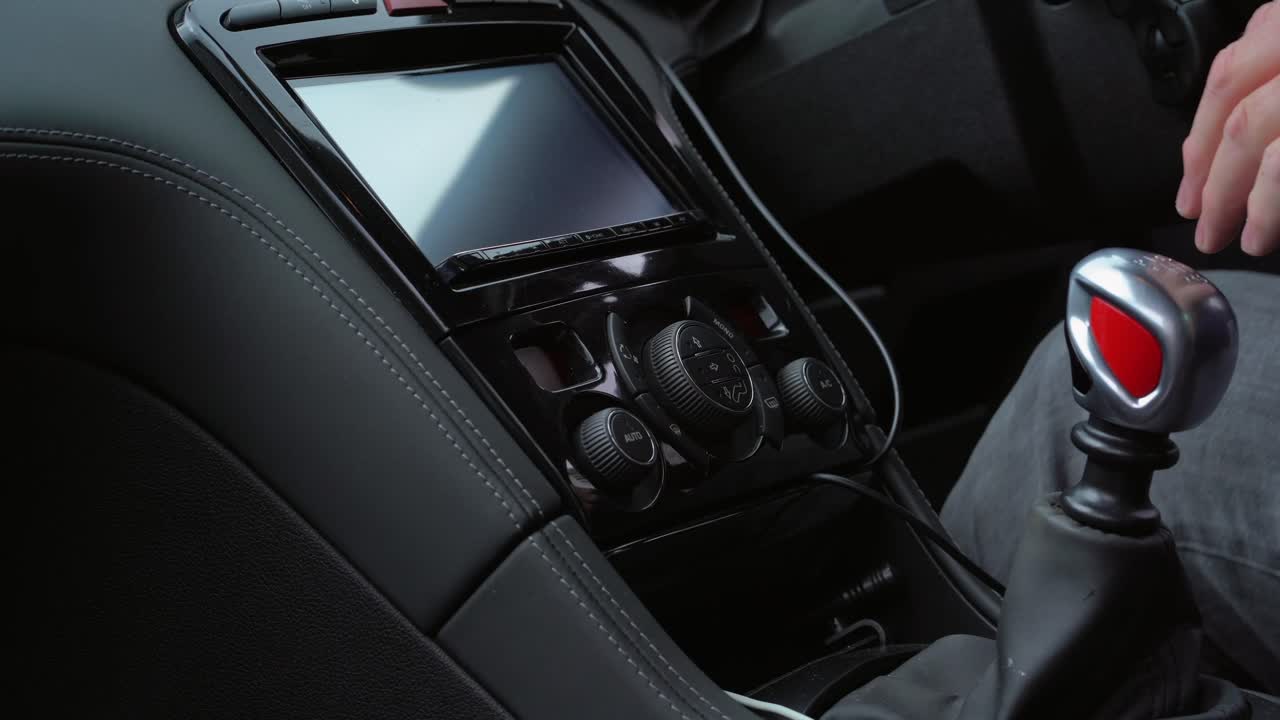 Car air conditioning being turned up right hand drive