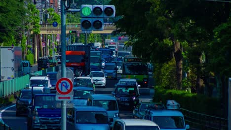 a timelapse of the traffic jam at the urban street in tokyo long shot