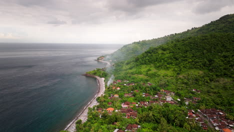 amed beach, bali in indonesia. aerial forward