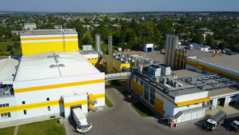 aerial view of industrial area. ladujun, ukraine - june 2017: aerial view of warehouse with trucks. industrial background. logistics from above