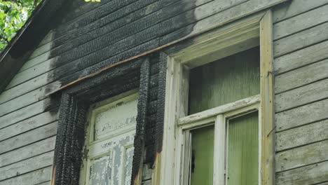 burn marks and scorched trim highlight abandoned house damaged by fire in usa