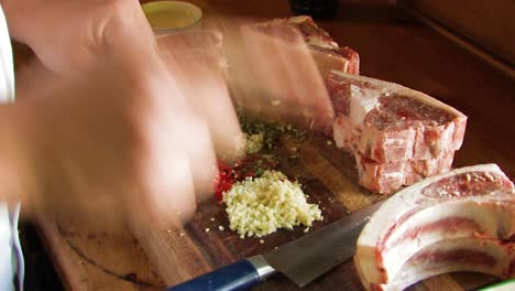 preparing a rack of lamb and chops with soices