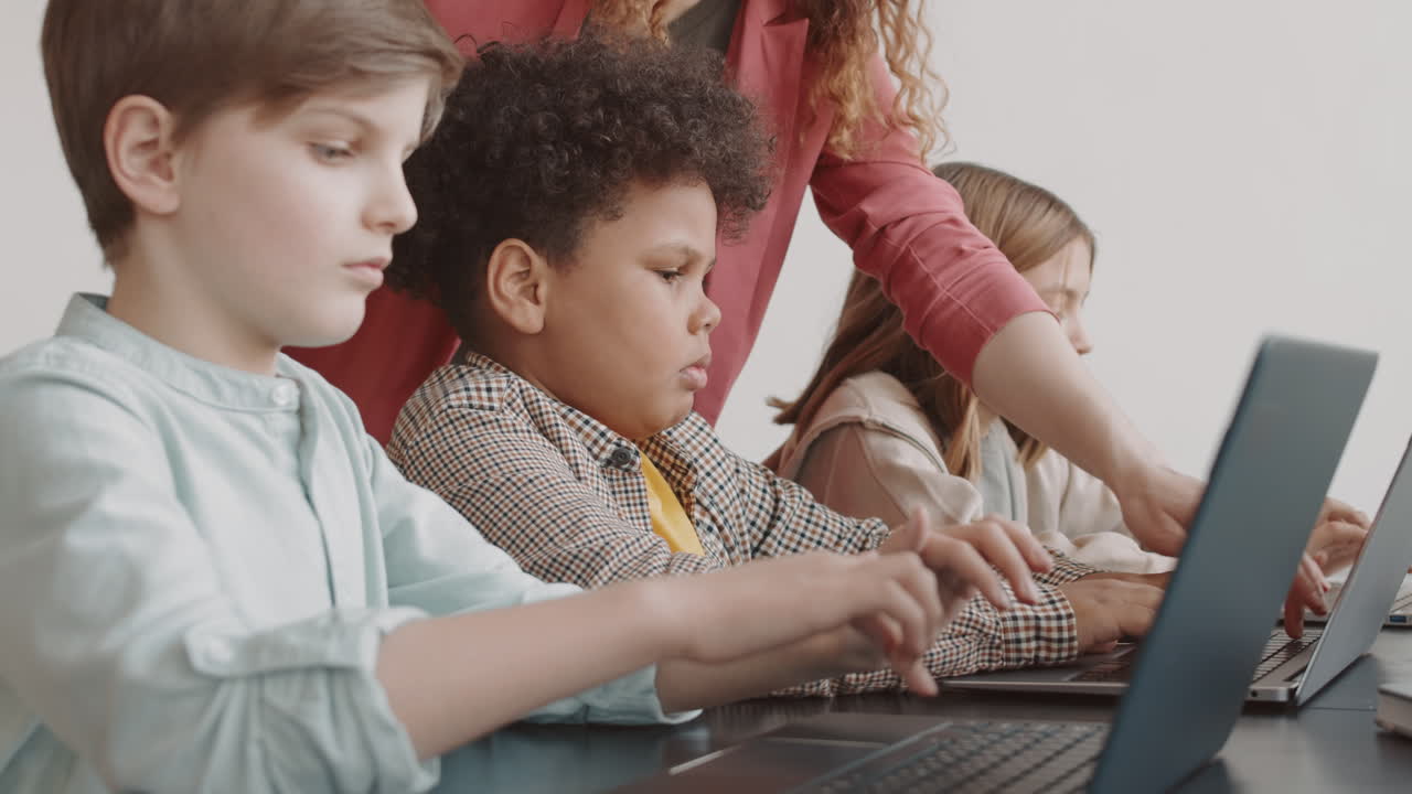 Students Typing on Computers on Lesson