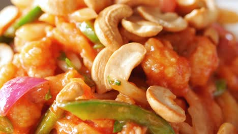 cashew nut salad on a plate on table ,
