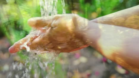 animation of a man washing his hands under a running tap