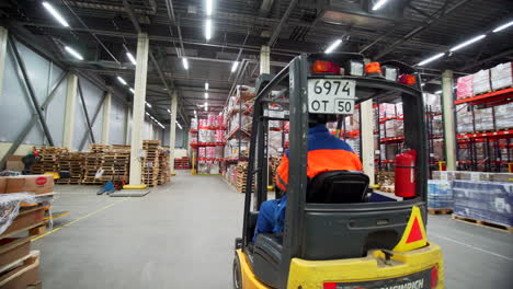 warehouse interior with forklift and pallets