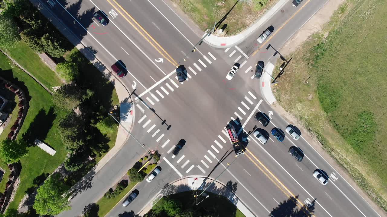 Aerial view of cars displays Motion Graphics of essential workers traveling.