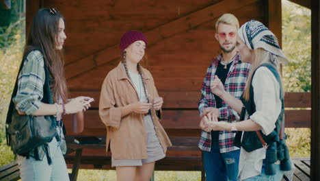 woman assisting tourists friends during vacation