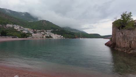 moody weather over sveti stefan and stari grad montenegro