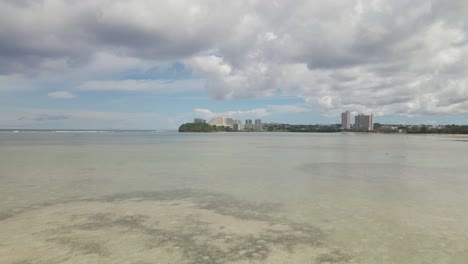 Low-flying-aerial-shot-over-Agana-Bay-on-Guam