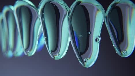abstract teal liquid drops