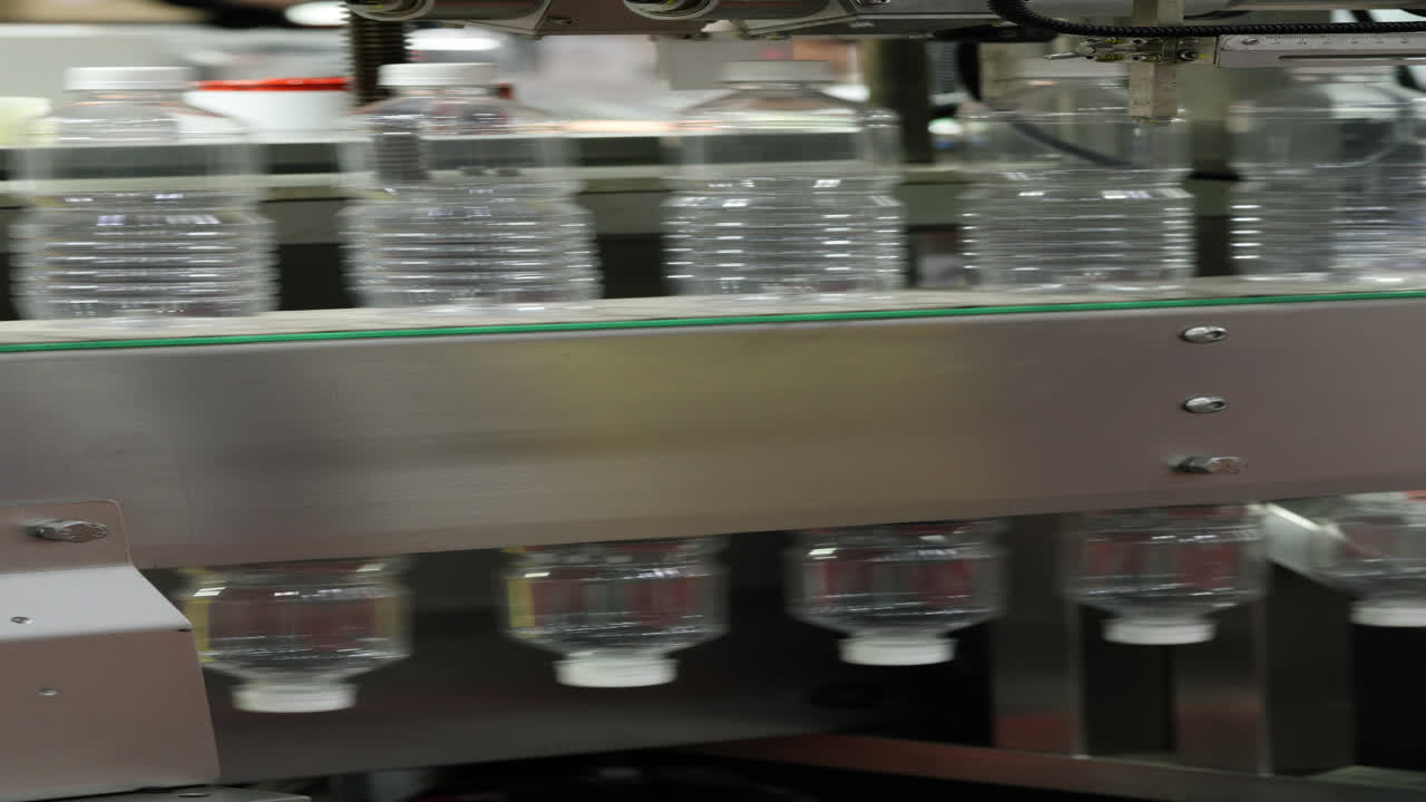 Automated Filling of Plastic Water Bottles on a Production Line