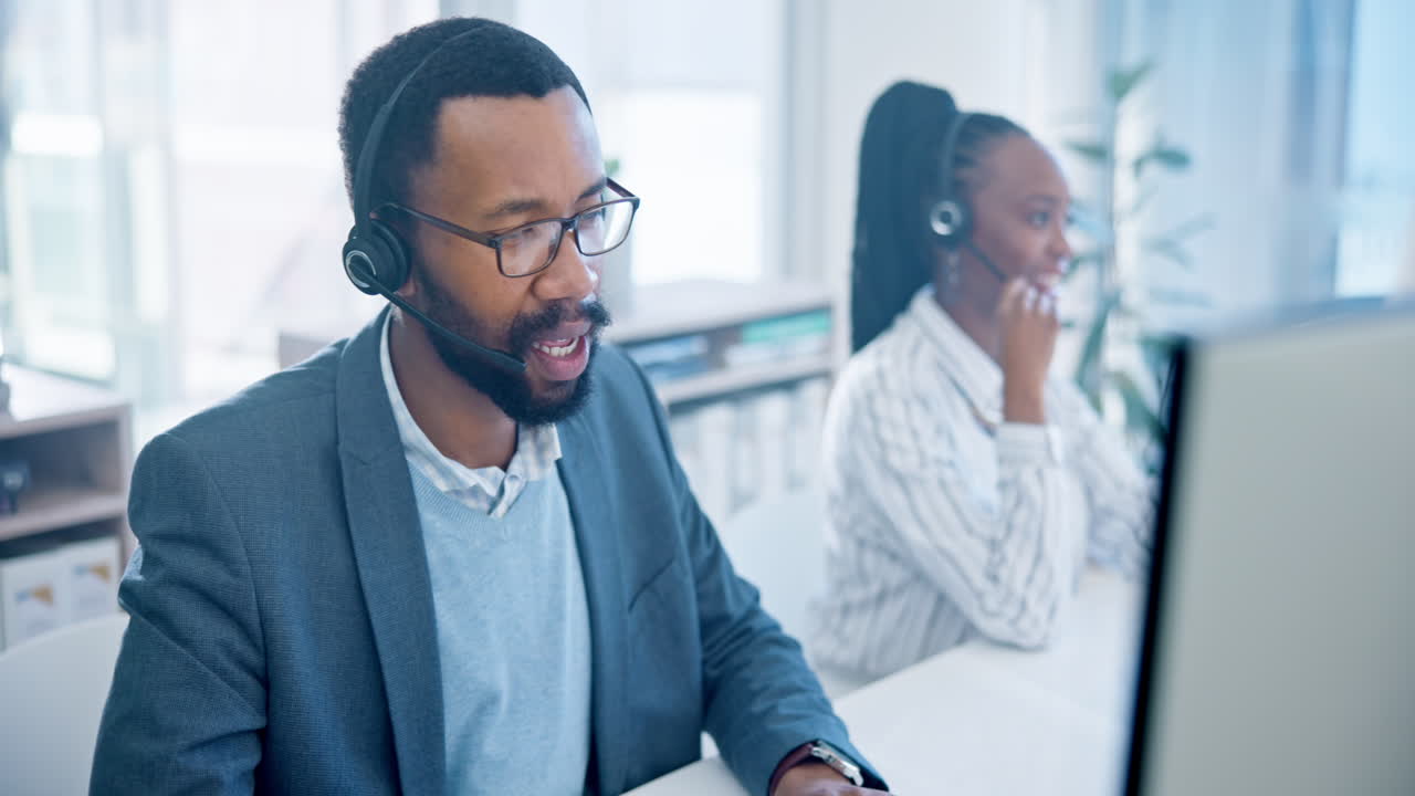 Premium stock video - Computer, call center and a black man consultant