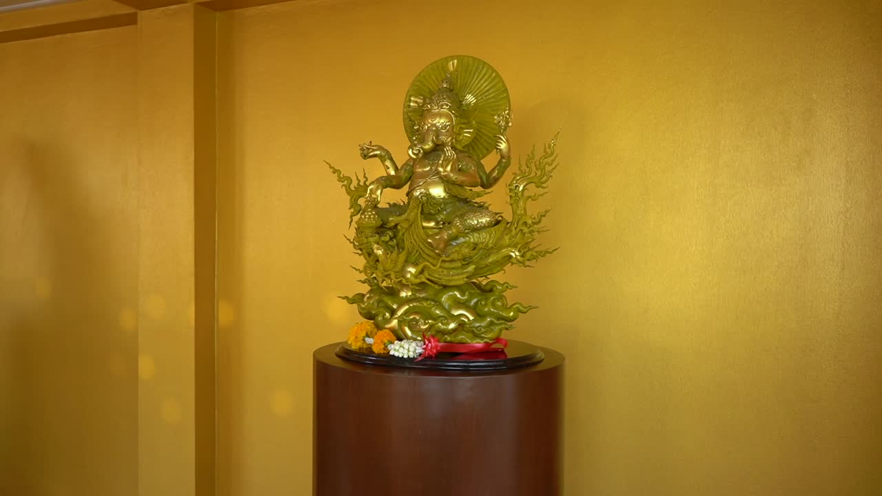 Amazing golden Ganesha statue at the White Temple, Thailand.