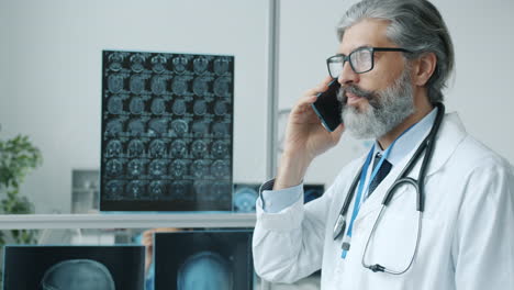 doctor talking on phone in medical office