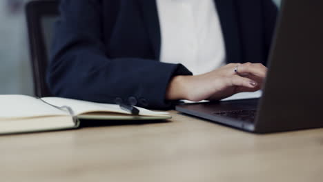 business woman, hands and writing in book