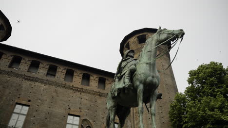 Acaja-castle-in-Turin-Italy-in-low-angle-orbital-shot