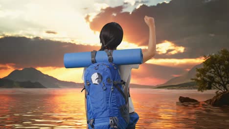 woman hiking at sunset