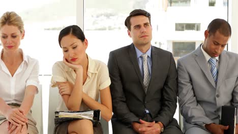 business people waiting for an interview