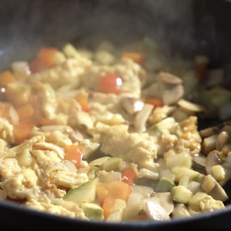 man cooking vegetable stew