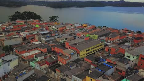 Drone-descending-over-the-favela-slums-in-Sao-Paulo,-Brazil