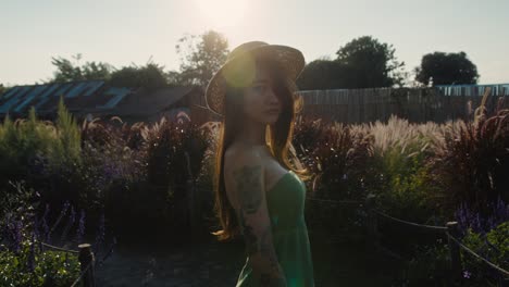 woman in a garden at sunset