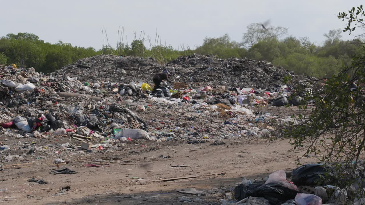 Rubbish tip, landfill, waste area in Lembongan Bali static ground