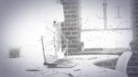 animación de la red de conexiones a través de un ordenador portátil en el escritorio