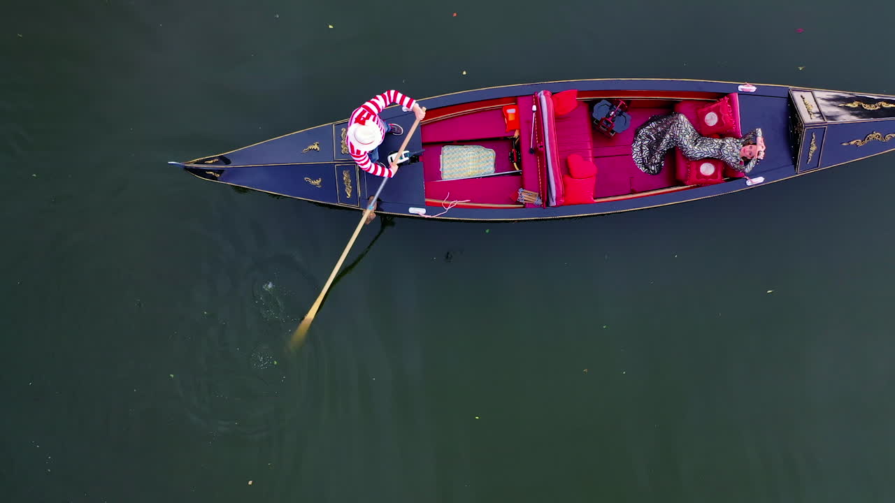Traditional gondola on river. Beautiful view of city river with gondola