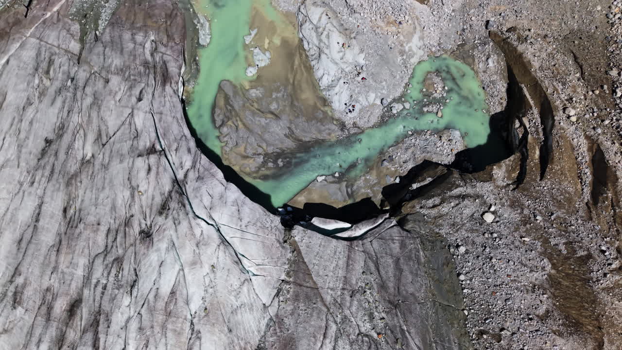 Aerial view of Morteratsch glacier landscape, serene and rugged terrain