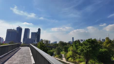benjakitti park bangkok thailand green space city building skyline nature landscape