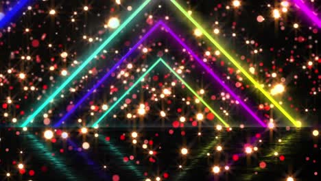 animación digital de triángulos de neón coloridos contra manchas rojas de luz sobre fondo negro