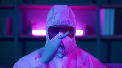 person in protective gear pointing