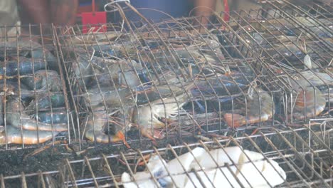 Grilled-live-blue-river-prawn-in-cage-on-hot-charcoal-at-Pattaya-fish-market