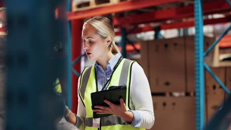 warehouse workers scanning barcodes and managing inventory