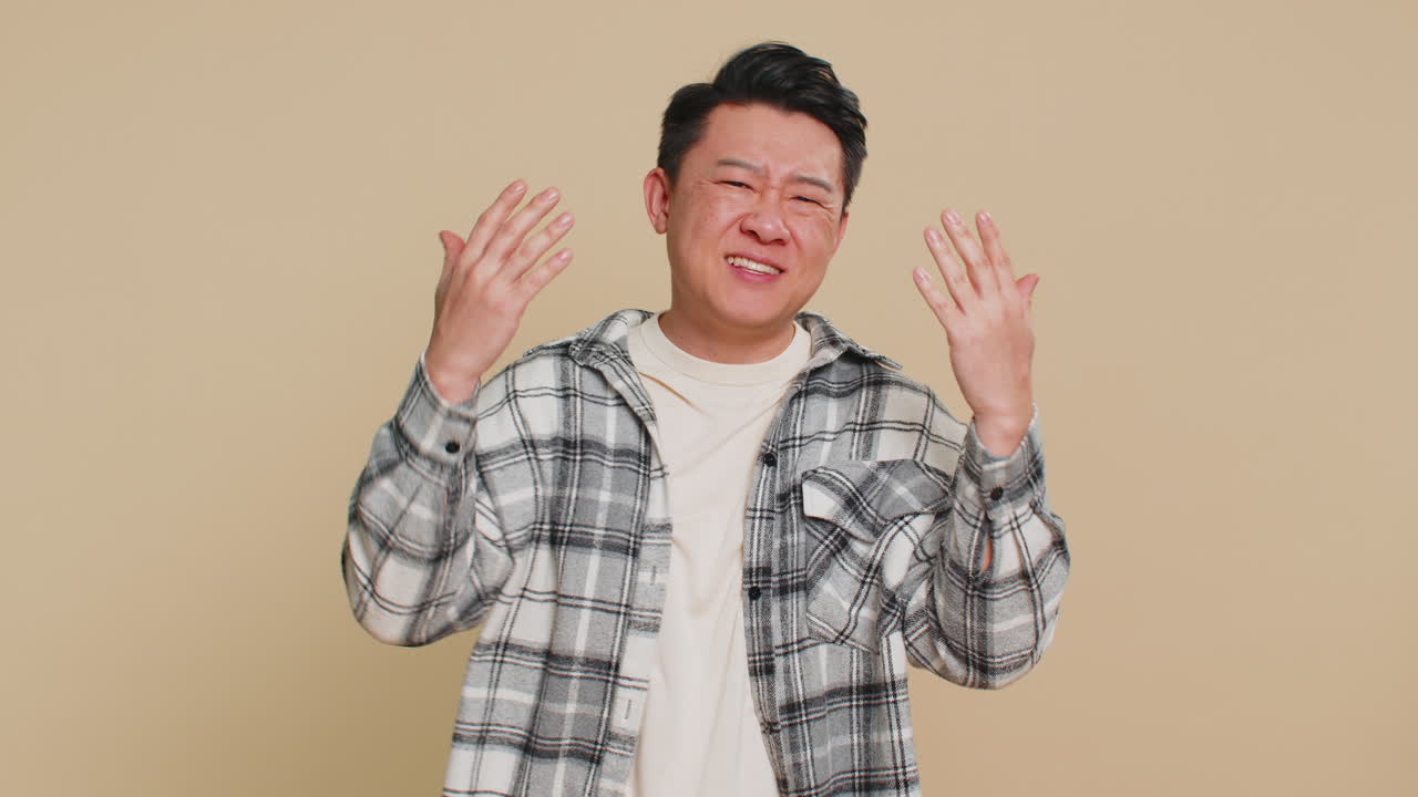 Sad mature man loses becoming surprised by lottery results bad fortune loss unlucky fortune news