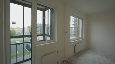 moving in new apartment, white interior, view of the rooms home construction